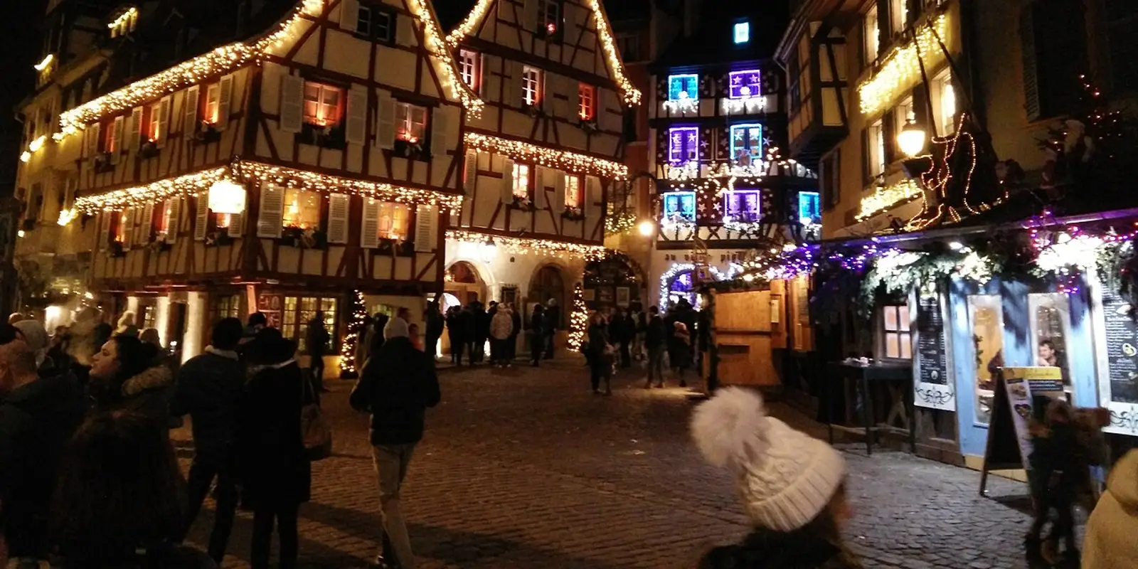 Christmas decorations and illuminated houses in Colmar at night