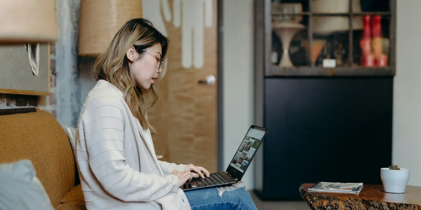 Traveler relaxing at home on wifi, installing an eSIM ahead of departure