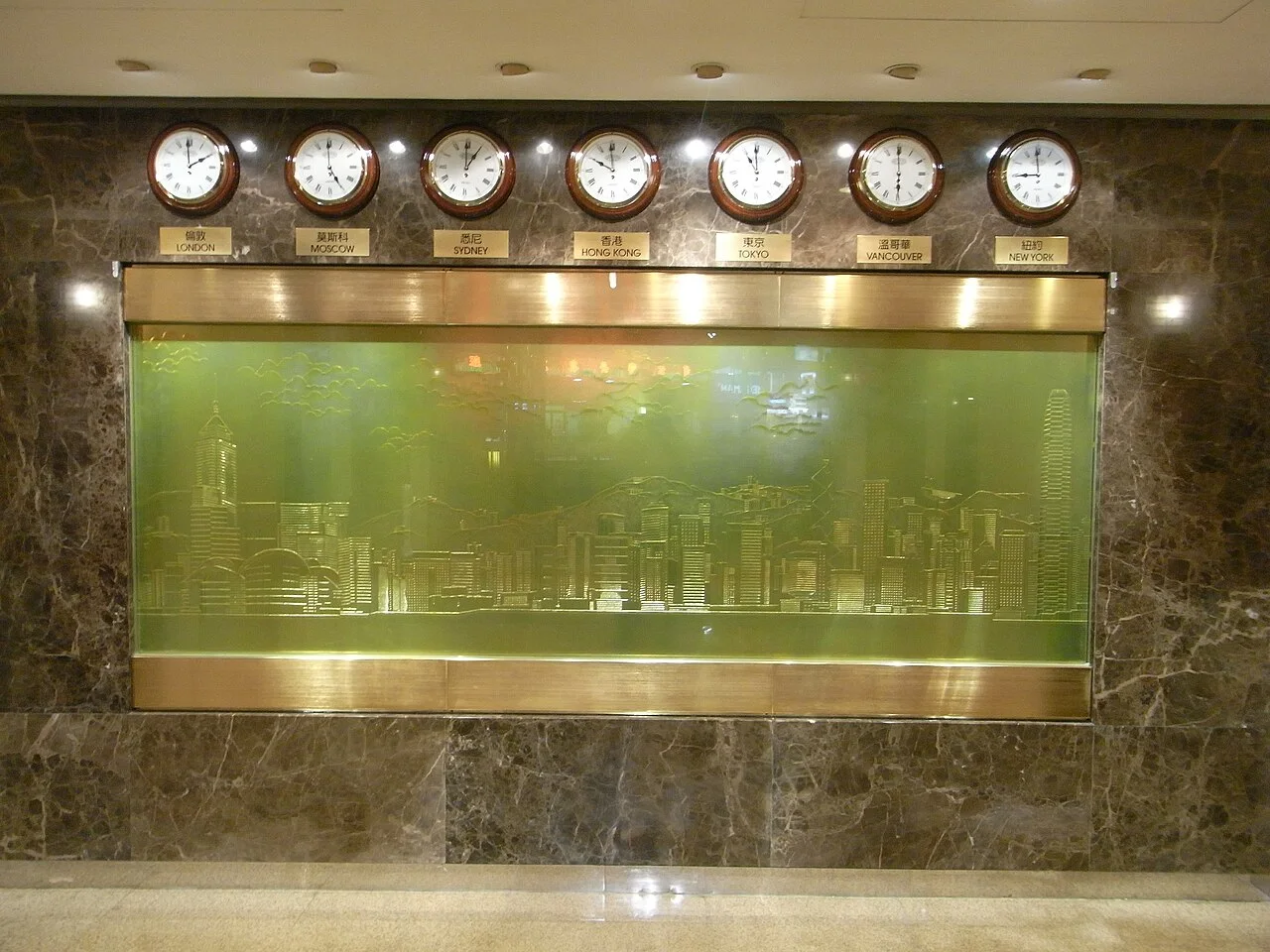 World clocks displayed in a hotel lobby